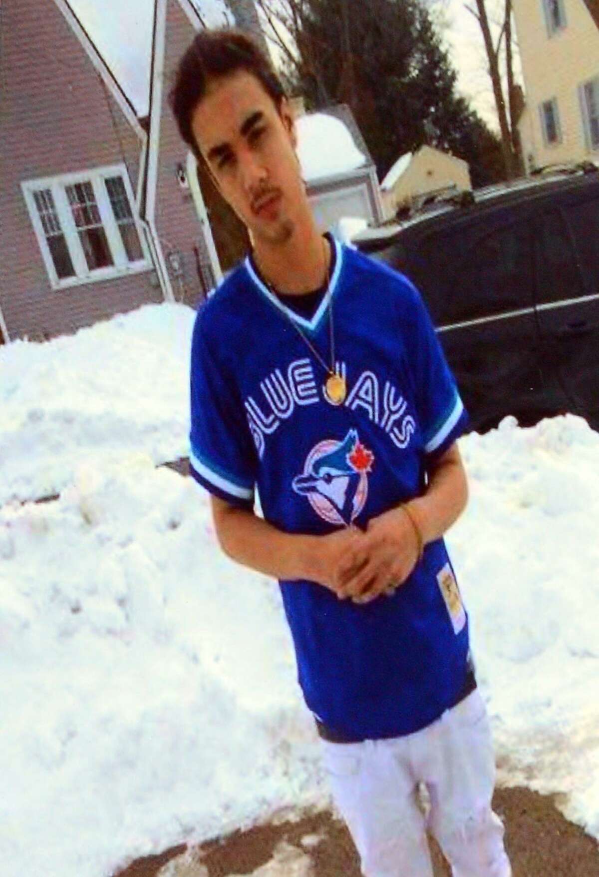 A photo of Eric Diaz at a memorial erected in his honor on Beardsley Street in Bridgeport, Conn. on Thursday Sept. 15, 2017. Bridgeport police spokesman Av Harris said the 19-year-old Diaz was shot dead Thursday around 11 p.m. Diaz was found shot in the stomach after police responded to a report of shots fired at the intersection of Beardsley Street and Newfield Avenue.