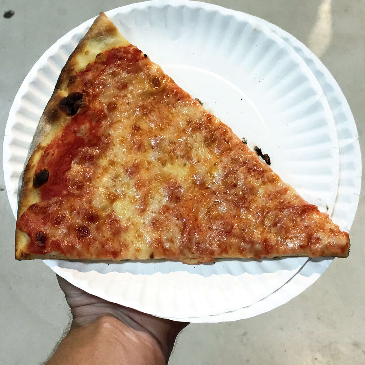 A slice of New Haven-style pizza from Randy's Wooster Street Pizza can be purchased in the Connecticut Building at The Big E in West Springfield, Massachusetts.