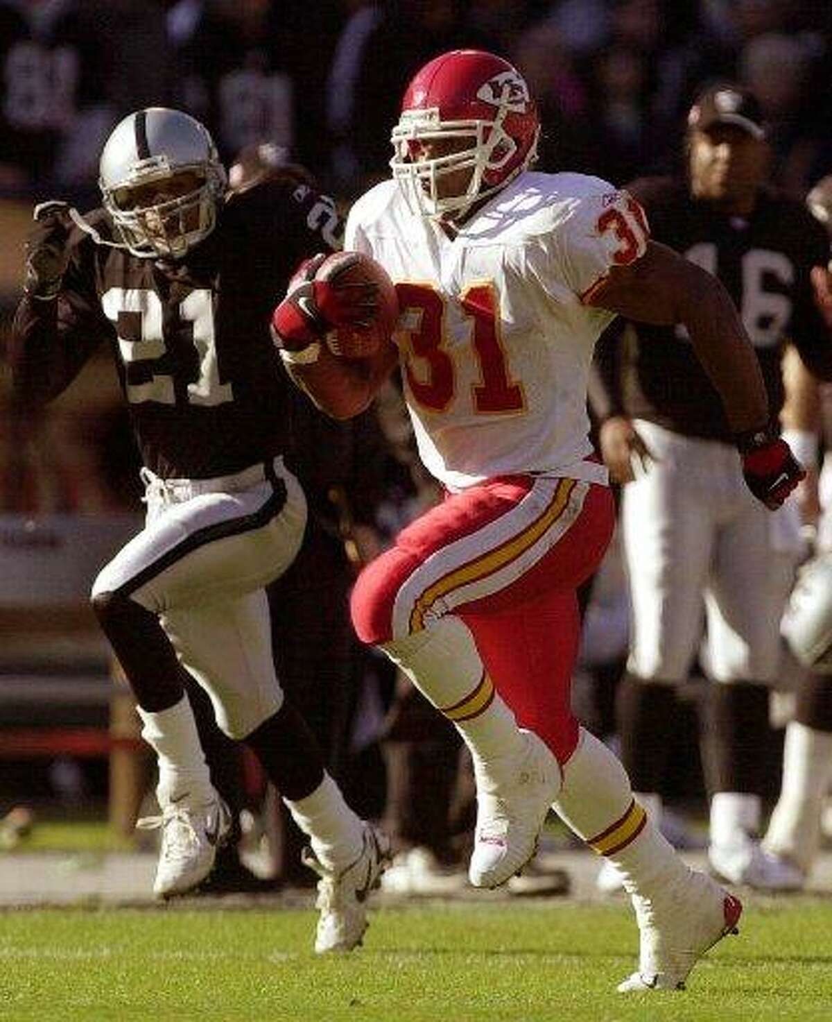 Kansas City Chiefs running back Priest Holmes scored three