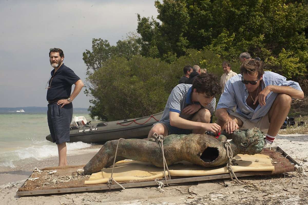 In �Call Me by Your Name,� teenager Elio (Timothee Chalamet, center) develops feelings for doctoral student Oliver (Armie Hammer), who works for Elio�s father, Mr. Perlman (Michael Stuhlbarg, left).�CAPTION CREDIT:Sony Pictures Classics