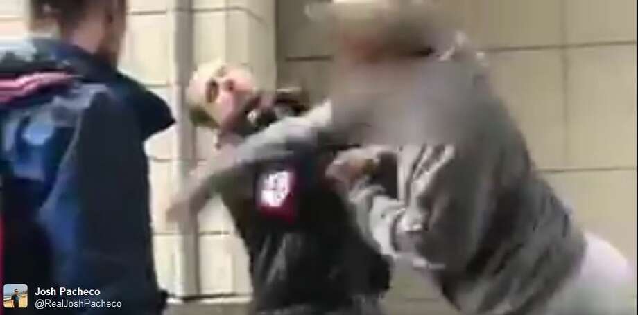 Video: Man wearing swastika armband punched in downtown Seattle ...