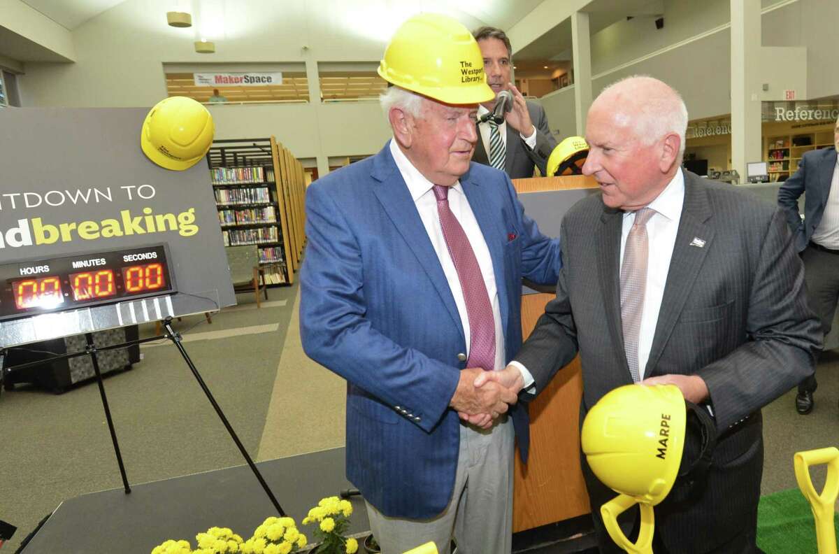 Cornerstone Society donor Christian Trefz shakes First selecman Jim Marpe's hand after a groundbreaking ceremony at the Westport Library on Thursday September 14, 2017 in Westport Conn. to announce the new library renovation and transformation project to begin in September