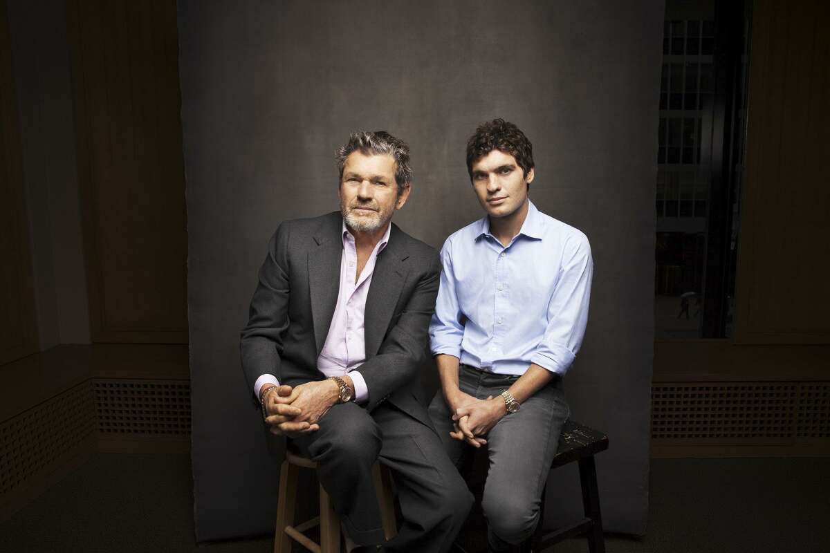 FILE From left, Jann Wenner, founder of Rolling Stone magazine, and his youngest son, Gus Wenner, at the magazines headquarters in New York City, Oct. 13, 2016. In response to the financial downturn facing the entire publishing industry, Jann Wenner has aggressively sold off the assets of Rolling Stones parent company, Wenner Media, including Us Weekly and Mens Journal. Both Jann and Gus Wenner said they hoped to stay on at Rolling Stone under a new owner, but its sale would likely conclude their reign.