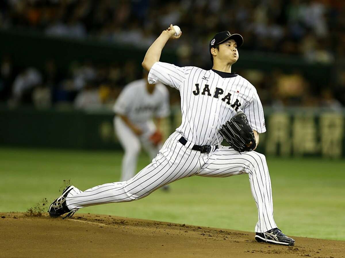 FILE - In this Nov. 19, 2015, file photo, Japan's starter Shohei Otani pitches against South Korea during the first inning of their semifinal game at the Premier12 world baseball tournament at Tokyo Dome in Tokyo. Shohei Otani is likely to leave Japan and sign with a Major League Baseball team after this season, multiple reports in Japanese media said Wednesday, Sept. 13, 2017, a move that would cost the 23-year-old pitcher and outfielder more than $100 million. (AP Photo/Toru Takahashi, File)