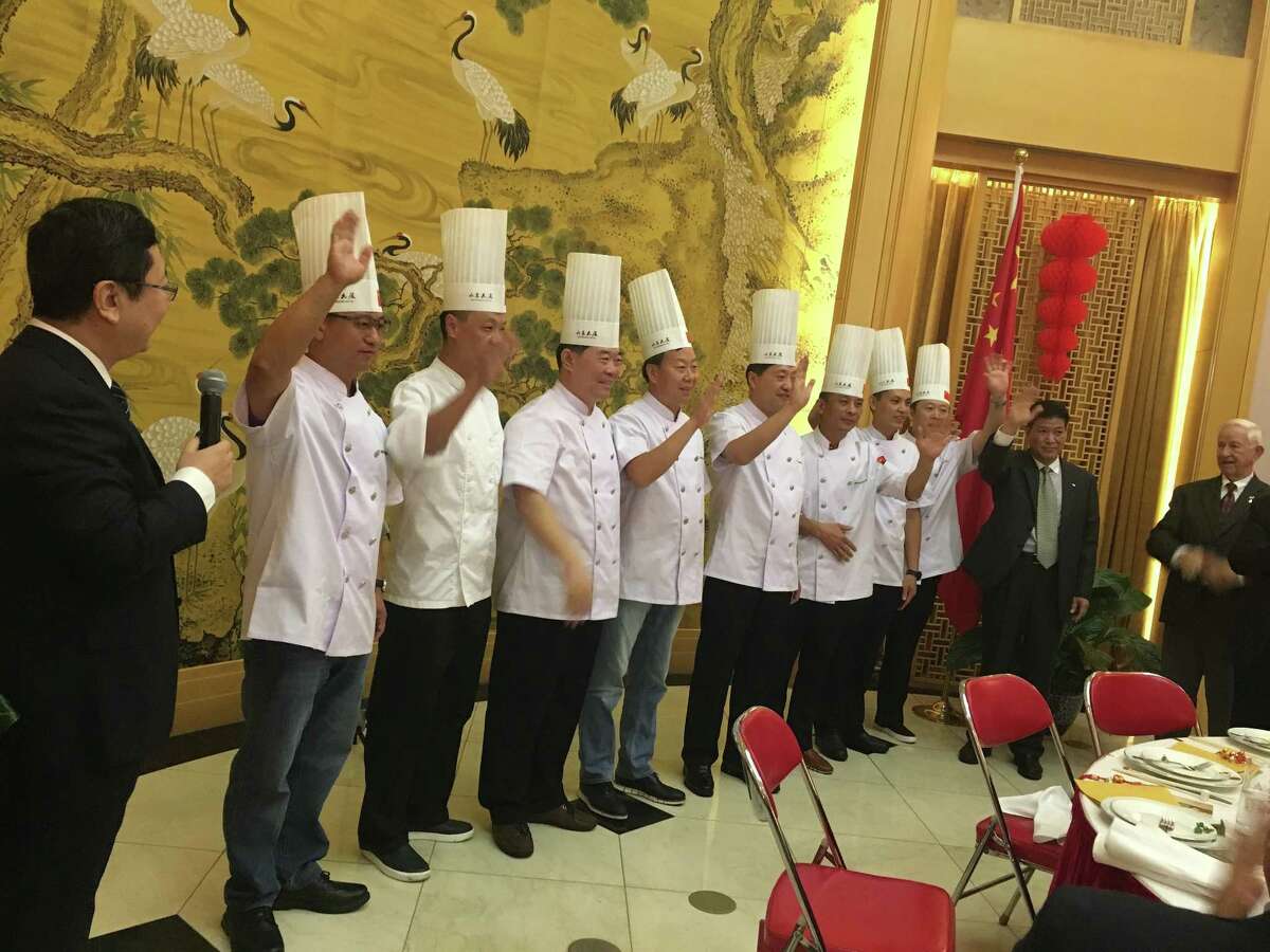 Shandong chefs take a bow during a private dinner at the consul general's residence in Houston.