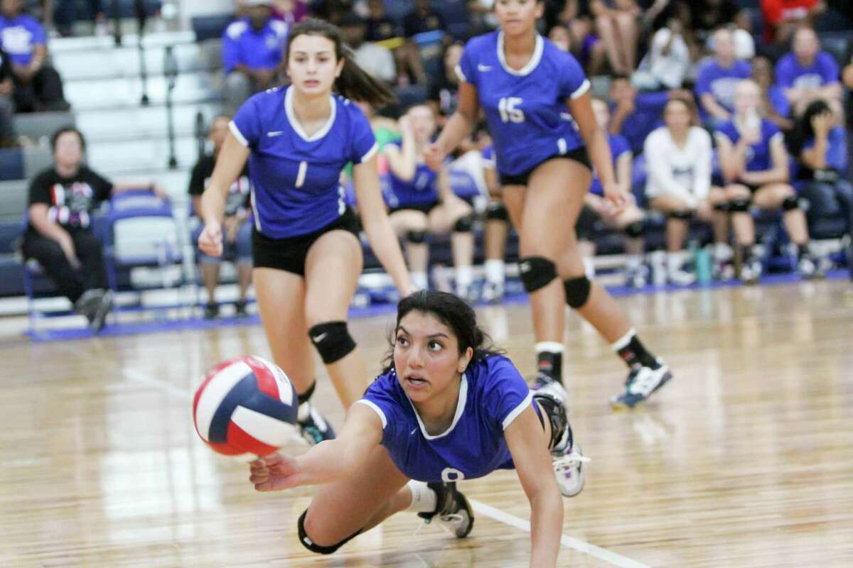 Randolph's Briana Gomez dives to keep the ball alive during the Ro-Hawks' District 27-3A match with Yoakum Friday.