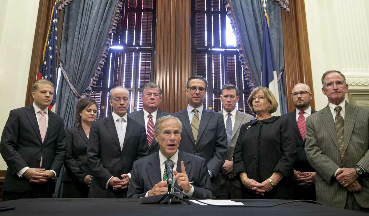 Proposition 3 will change the length of time gubernatorial holdover appointments can serve. Here’s how it works: Gov. Greg Abbott, shown here with his new staff on Sept. 18, makes his appointments, but Proposition 3 would not allow holdover appointees to hold office beyond the last day of the regular legislative session after the appointee’s term has expired.