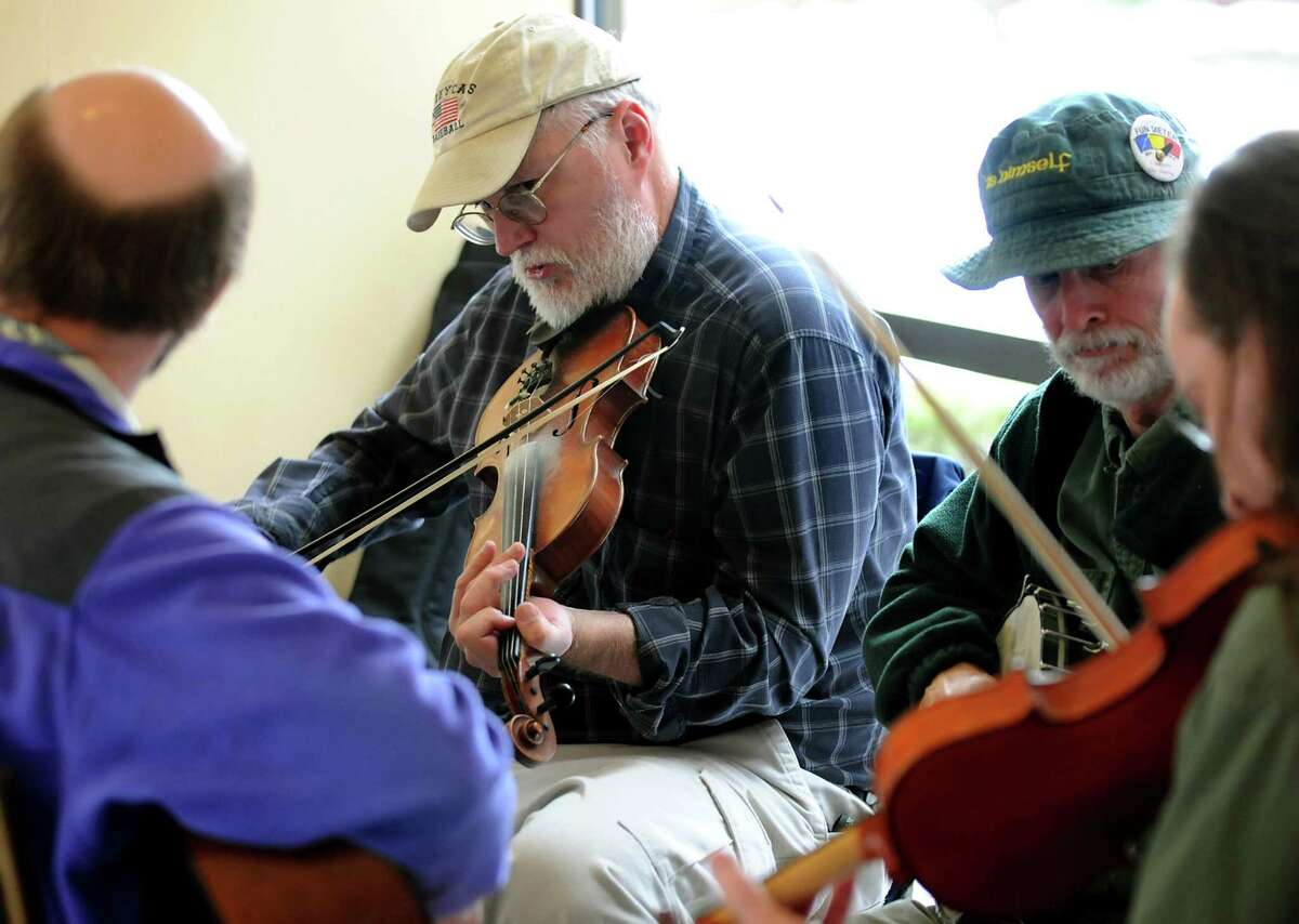 Mike Jarboe fiddles in a jam session at the Dance Flurry on Saturday, Feb. 13, 2010, at the Hilton in Saratoga Springs, N.Y. (Cindy Schultz / Times Union)