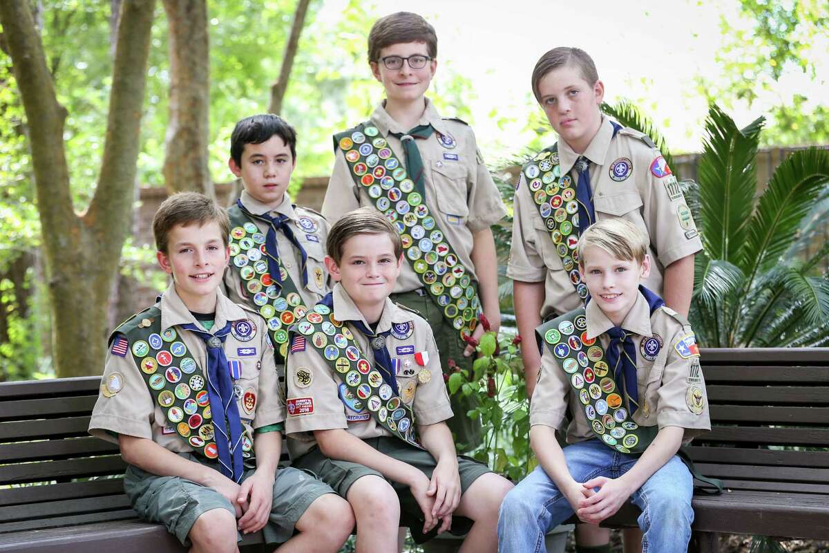 Boy Scouts, from the left: Jarrett Kotalik, Edward Poon, Rafe Kotalik, Noah Kotalik, Brock Romanski, Gage Maddox pose for a photo on Sunday, Sept. 17, 2017, at The Woodlands Community Presbyterian Church.