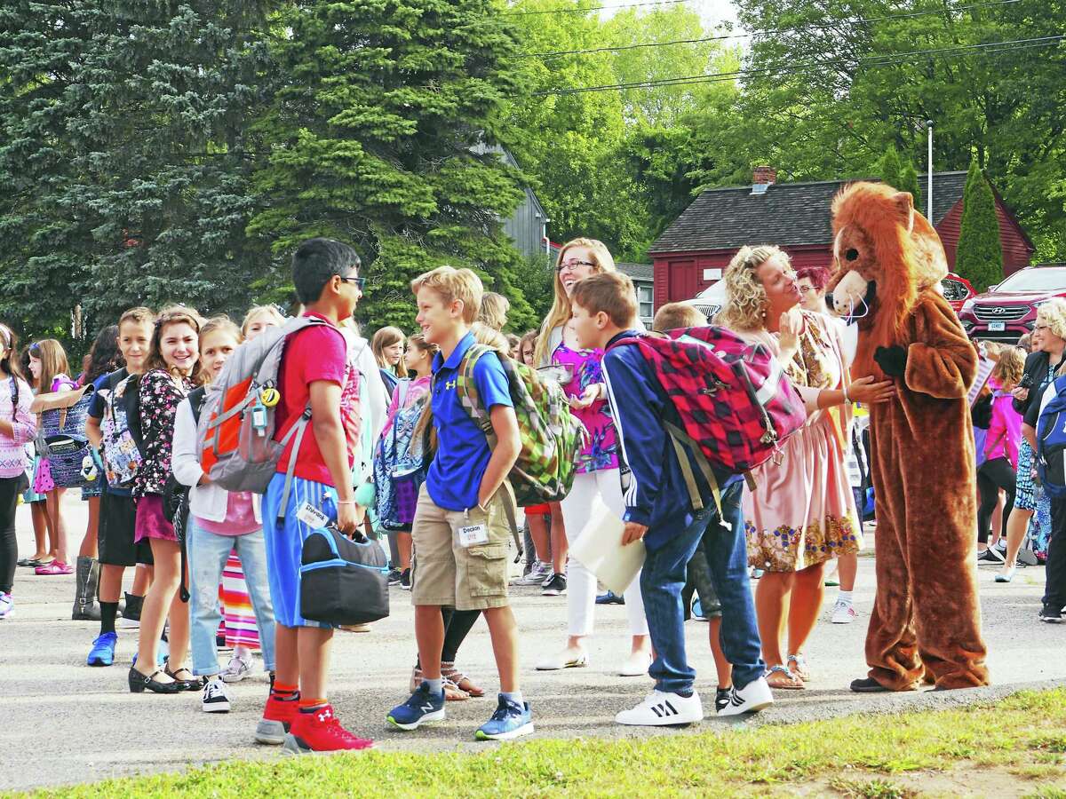Children gathered excitedly for the first day of classes at Center School in East Hampton Wednesday morning.