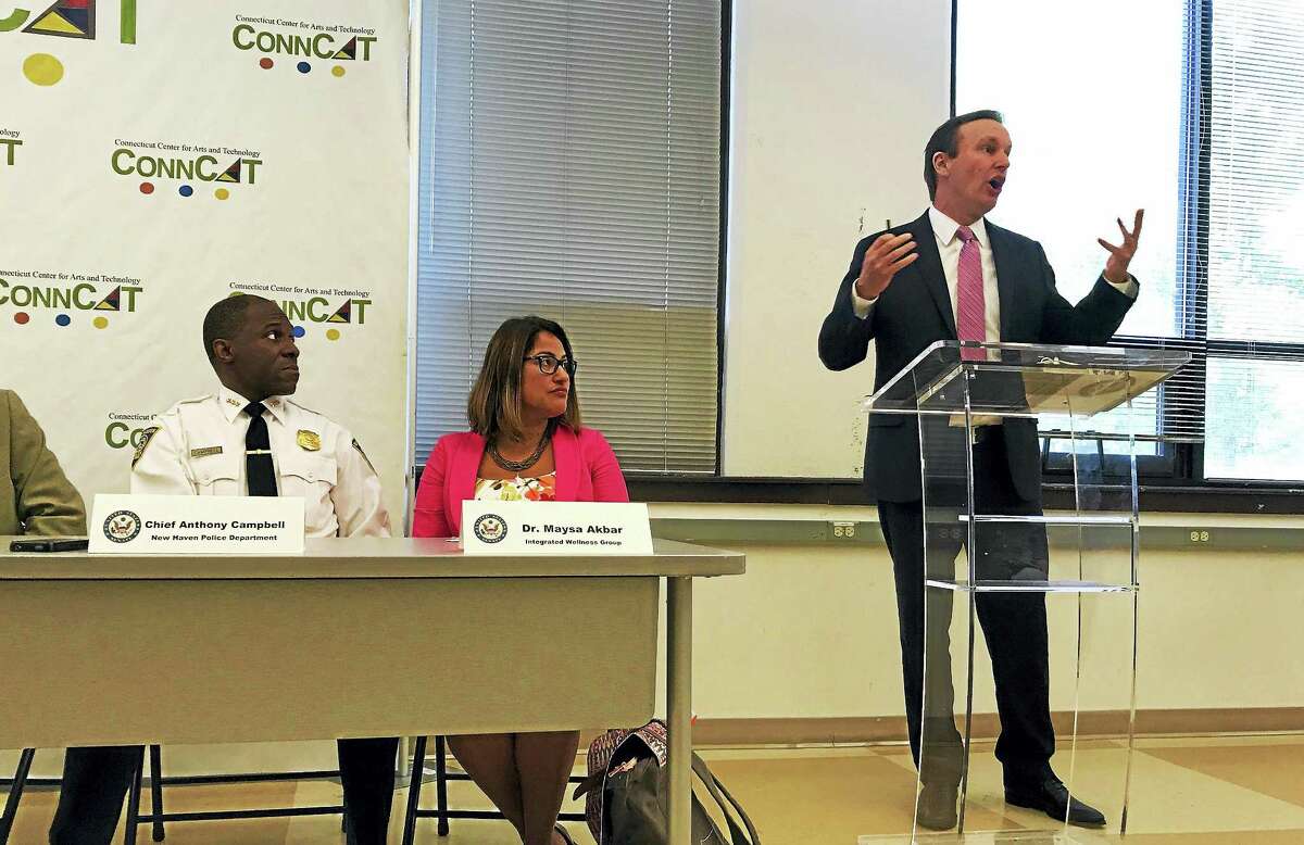 From left, New Haven Police Chief Anthony Campbell, Yale Child Study Center professor Maysa Akbar and U.S. Sen. Chris Murphy, D-Conn., during a forum on childhood trauma Wednesday in New Haven.