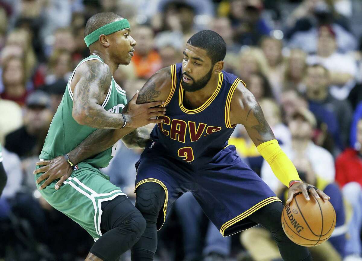 In this Nov. 3, 2016 photo, Cleveland Cavaliers’ Kyrie Irving, right, looks to drive against Boston Celtics’ Isaiah Thomas during the first half of an NBA basketball game in Cleveland. Irving, who asked Cavaliers owner Dan Gilbert to trade him earlier this summer, could be on his way to Boston as the Cavaliers are in serious negotiations with the Celtics about swapping him for point guard Thomas. Since Irving made his stunning request, the defending Eastern Conference champions have been looking for a trade partner. They may have found the perfect one and could be nearing a deal with the Celtics, said the person who spoke Tuesday night, Aug. 22, 2017, to The Associated Press on condition of anonymity because of the sensitivity of the talks.