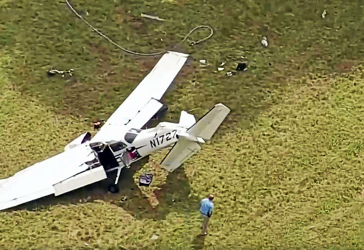 A man is dead and two people are injured after a plane from Danbury Municipal Airport crashed at Candlelight Farms Airport in New Milford on Friday.