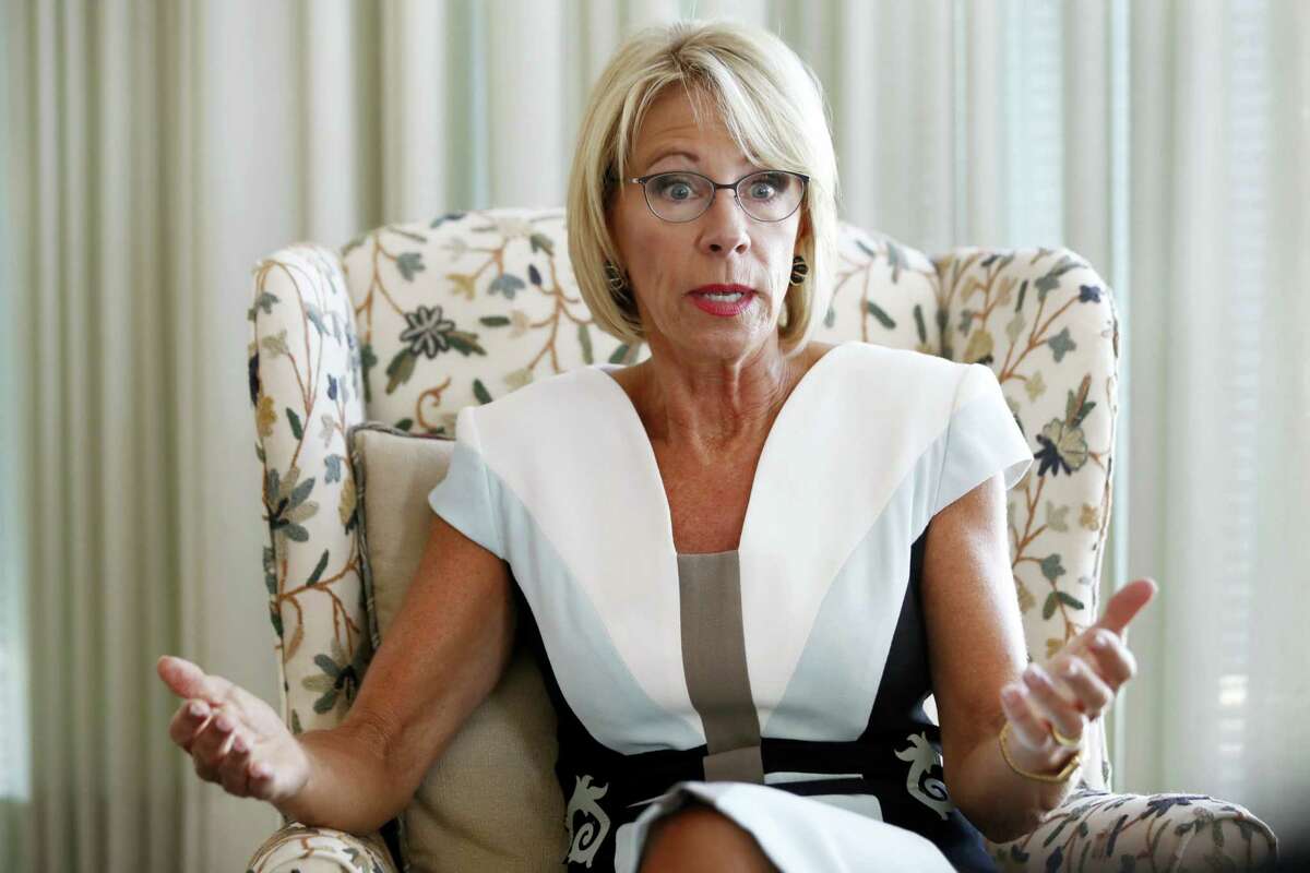 Education Secretary Betsy DeVos is interviewed in her office at the Education Department in Washington, Wednesday, Aug. 9, 2017. DeVos is distancing herself from earlier comments about the nation’s historically black colleges and universities being pioneers of school choice. In an interview with the Associated Press, she has acknowledged that in the past “racism was rampant and there were no choices” for African-Americans in higher education.