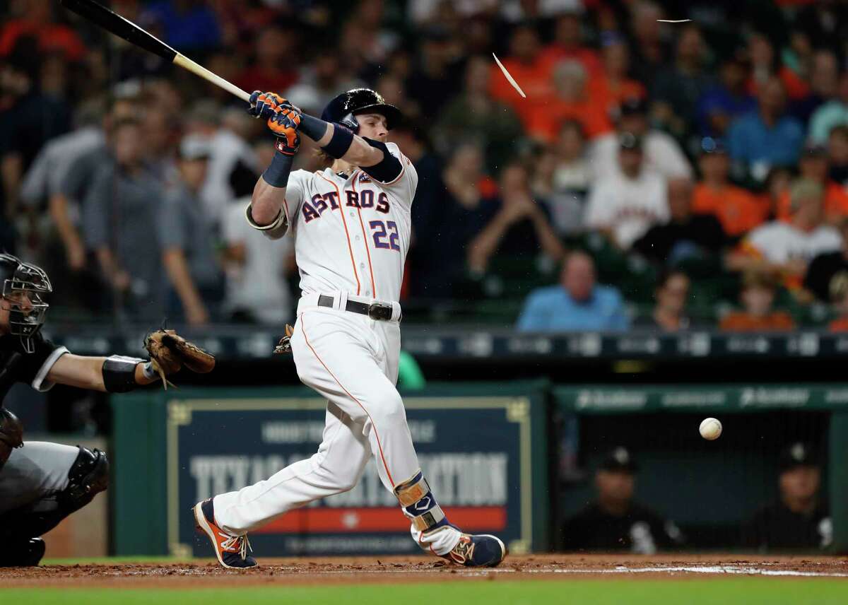 Houston Astros Josh Reddick (22) breaks his bat during the first inning of an MLB baseball game at Minute Maid Park, Tuesday, Sept. 19, 2017, in Houston.