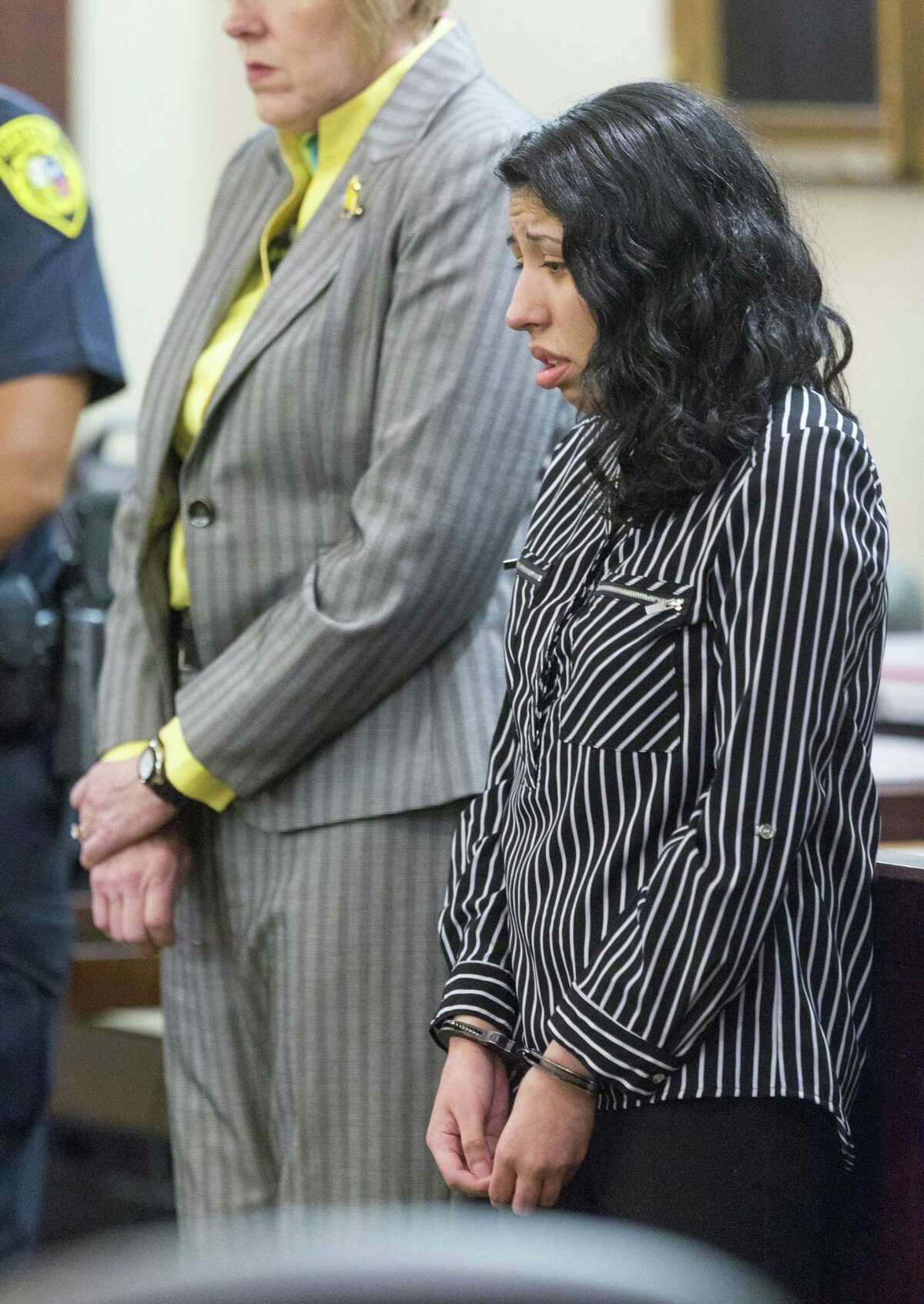 Antoinette Martinez listens Tuesday, Sept. 19, 2017 to victim impact statements after she was convicted of two counts of capital murder for killing Xavier Cordero, Jr. and Steven Rendon in 2014. Prosecutors did not seek the death penalty so Martinez was automatically given life without parole.