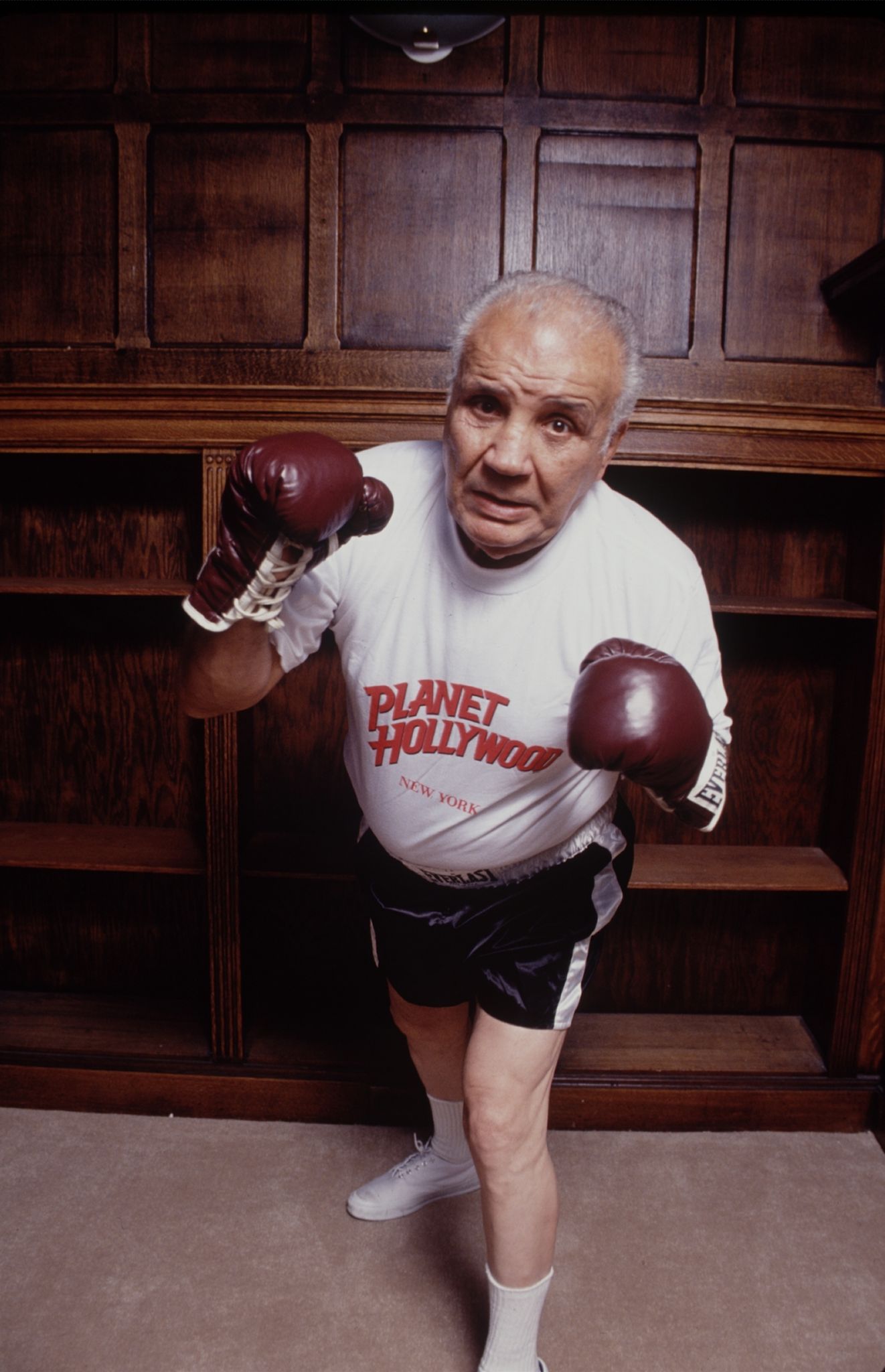 Boxer Joe Louis Wearing Boxing Gloves Framed Print by Bettmann
