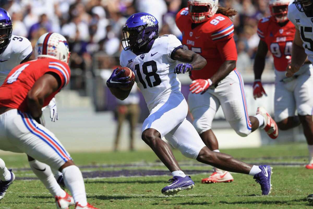 Jalen Reagor (18) of the TCU Horned Frogs runs for yardage against the SMU Mustangs in the first half at Amon G. Carter Stadium on Sept. 16, 2017 in Fort Worth.