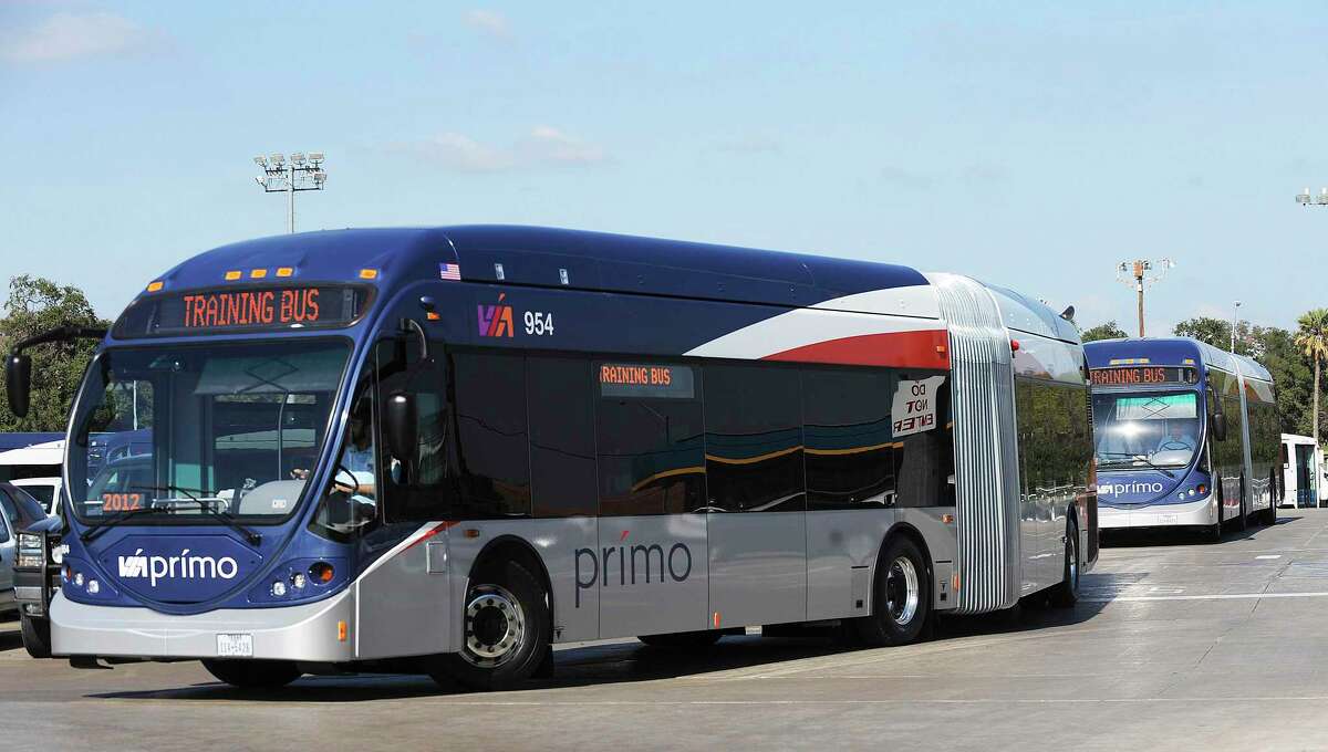 New VIA Primo articulated buses circle a parking area as drivers train in 2012. A new Primo route has opened between transit hubs at Brooks and the Kelly and Lackland areas.