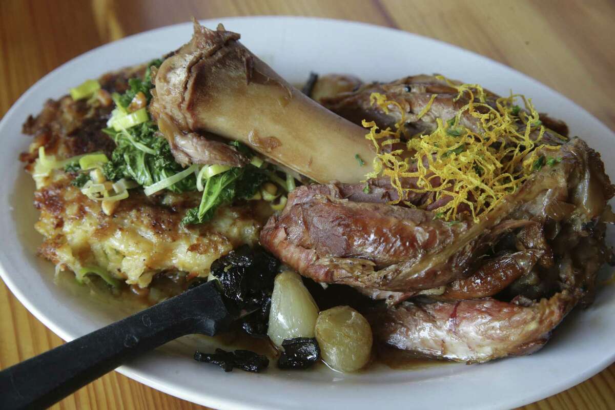 Schweinshaxe is a roasted pork shank with a potato pancake at Krause’s Cafe.