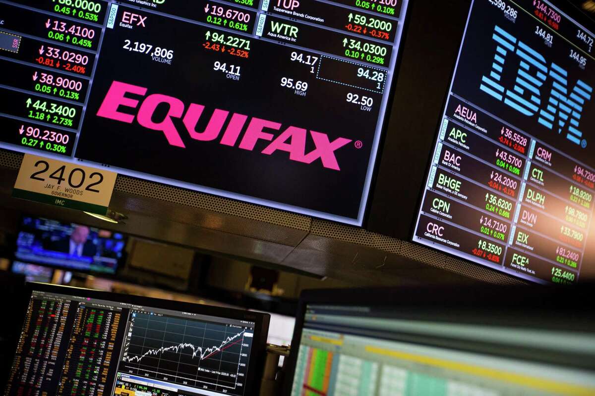 A monitor displays Equifax Inc. signage on the floor of the New York Stock Exchange (NYSE) in New York, U.S., on Friday, Sept. 15.