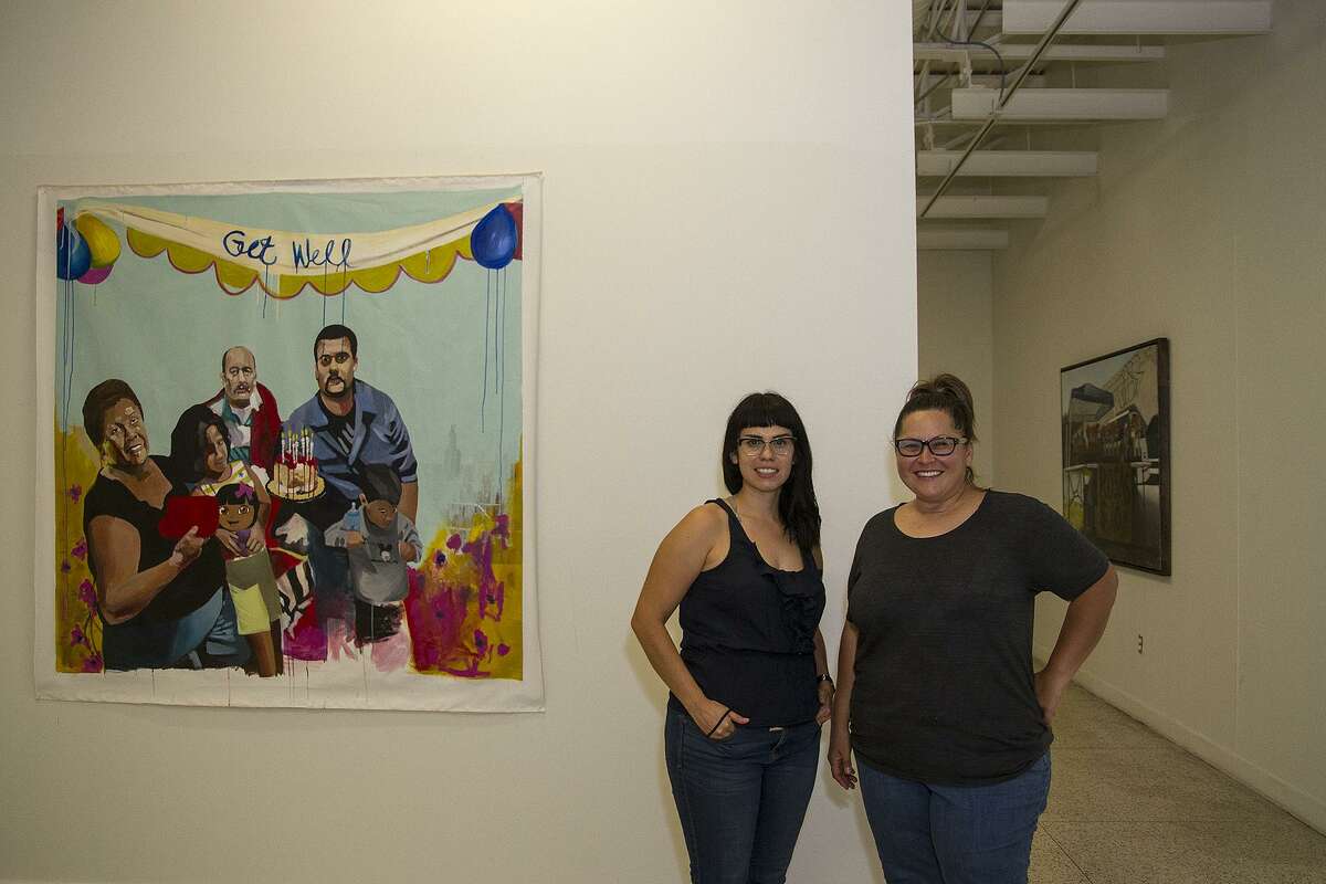 Artists Ruth Buentello (left) and Ana Fernandez pose for a photograph at Galeria Guadalupe where their work is on display in two solo shows.