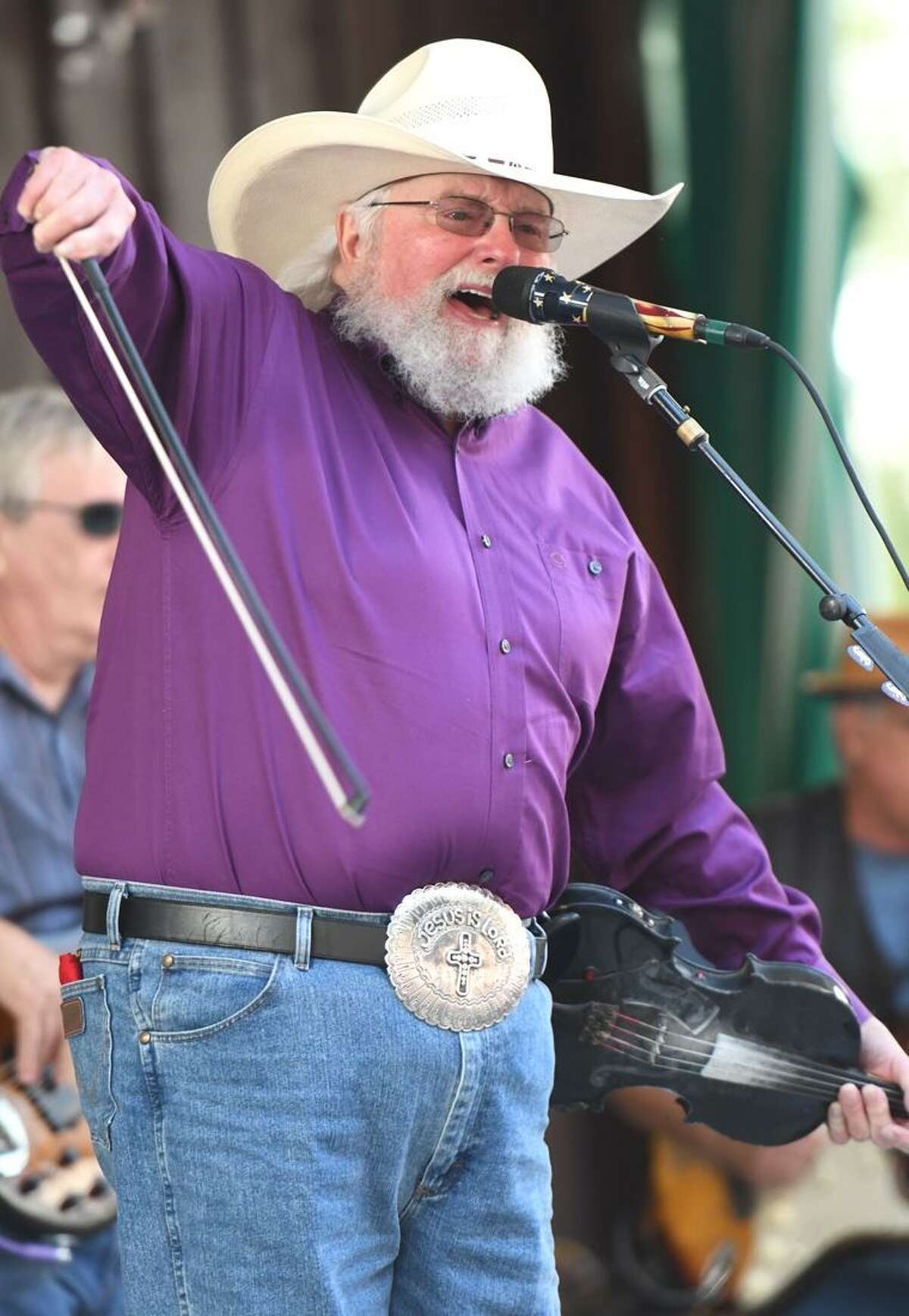 Singer, songwriter and multi-instrumentalist, Charlie Daniels is shown in action during his recent performance at the Indian Ranch Amphitheater in Webster, Massachusetts on Sept. 9. The 80-year old musician, perhaps best known for his number one country hit ?“The Devil Went Down To Georgia,?” has been an active singer, musician and touring artist since the 1950?’s. He was inducted into the Grand Ole Opry on Jan. 24, 2008and the ?“Musicians Hall of Fame and Museum?” in 2009. Daniels was inducted into the ?“Country Music Hall" of Fame in 2016. To learn more about the CDB 45th Anniversary Fiddle Sweepstakes, visit www.charliedaniels.com