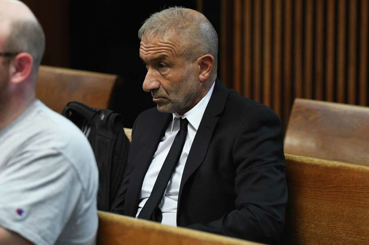 SUNY Polytechnic Institute Founding President and CEO Alain Kaloyeros awaits his arraignment on state charges while sitting in a courtroom at Albany City Courthouse on Friday morning, Sept. 23, 2016, in Albany, N.Y. (Will Waldron/Times Union)