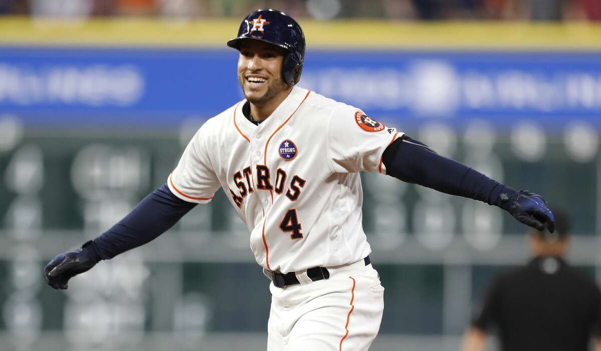 Houston Astros George Springer (4) reacts after Chicago White Sox left fielder Nicky Delmonico lept up to snag his fly out during the fifth inning of an MLB baseball game at Minute Maid Park, Wednesday, Sept. 20, 2017, in Houston. ( Karen Warren / Houston Chronicle )