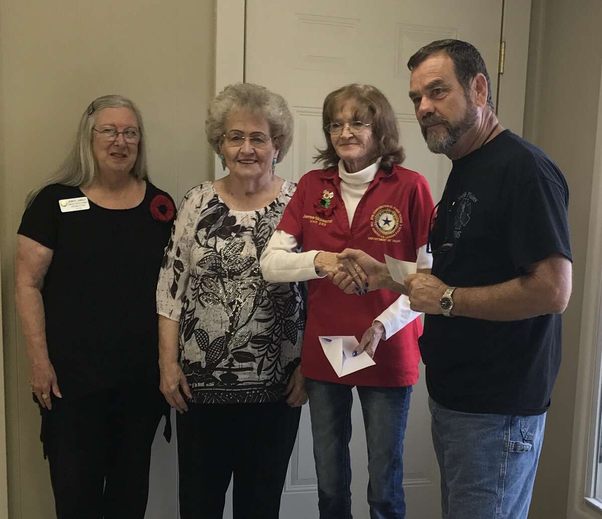 On Monday, three representatives of the American Legion Auxiliary Unit 260 in Plainview, Secretary Janice Langley (left), Theta Vaughan and President Jerree McKeeman, visited Lubbock to deliver a donation to Gary Vaughn, president of the Texas South Plains Honor Flight. The check represents funds collected through to sale of poppies to area residents. The donation is to honor and help send a veteran to Washington, D.C. on a trip of a lifetime. The next Honor Flight from Lubbock leaves Oct. 1.