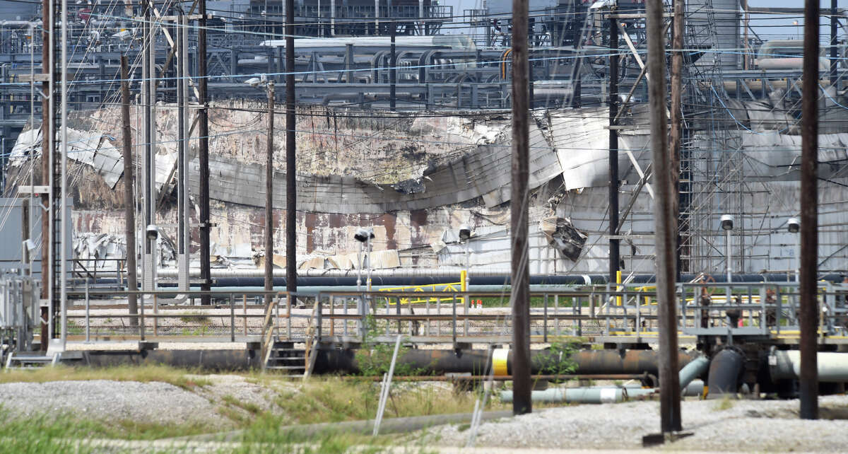 Damage to a large storage tank at Valero's Port Arthur facility can be seen Wednesday from a large fire that erupted on Tuesday. Photo taken Wednesday, September 20, 2017 Guiseppe Barranco/The Enterprise