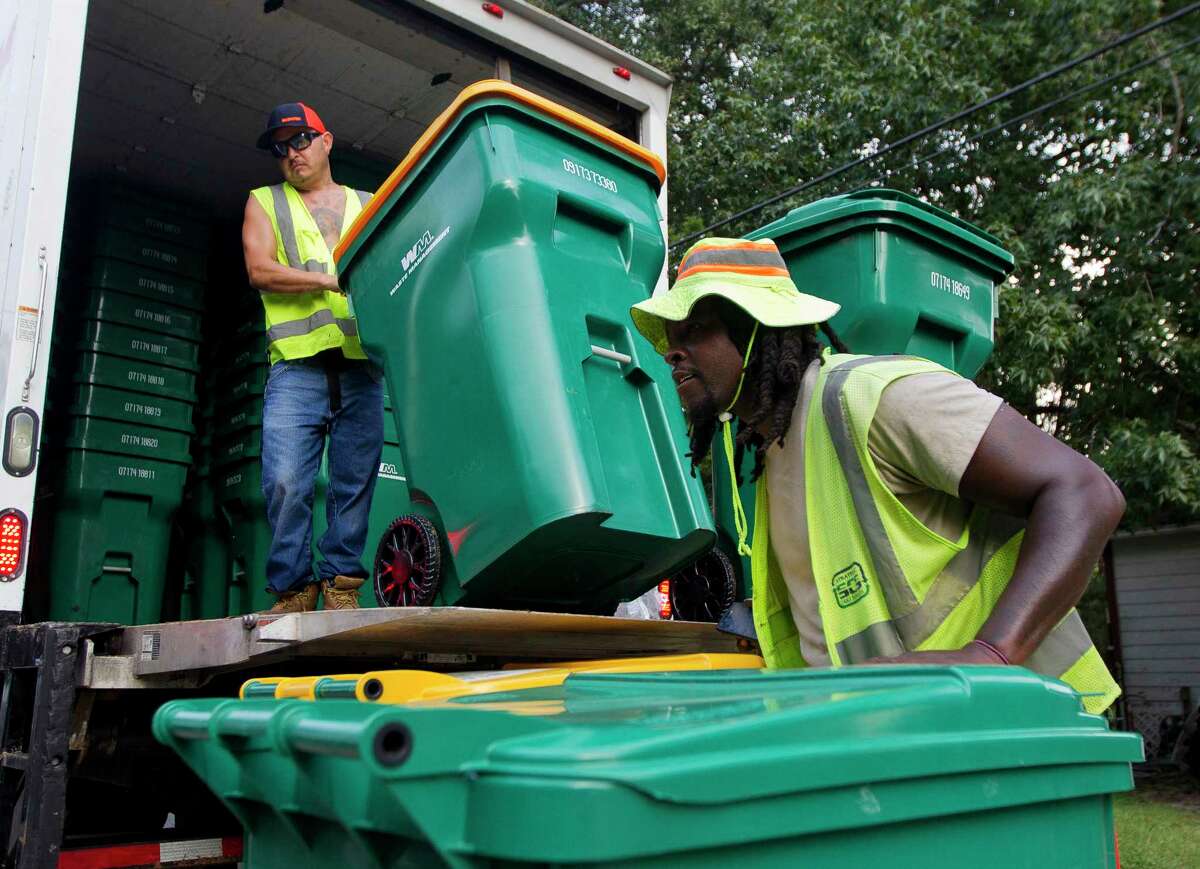 Waste Management delivers new trash cans, service in Conroe