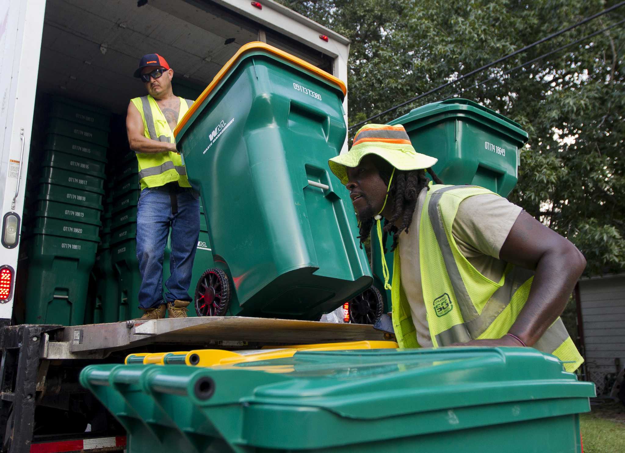 Waste Management delivers new trash cans, service in Conroe - Laredo