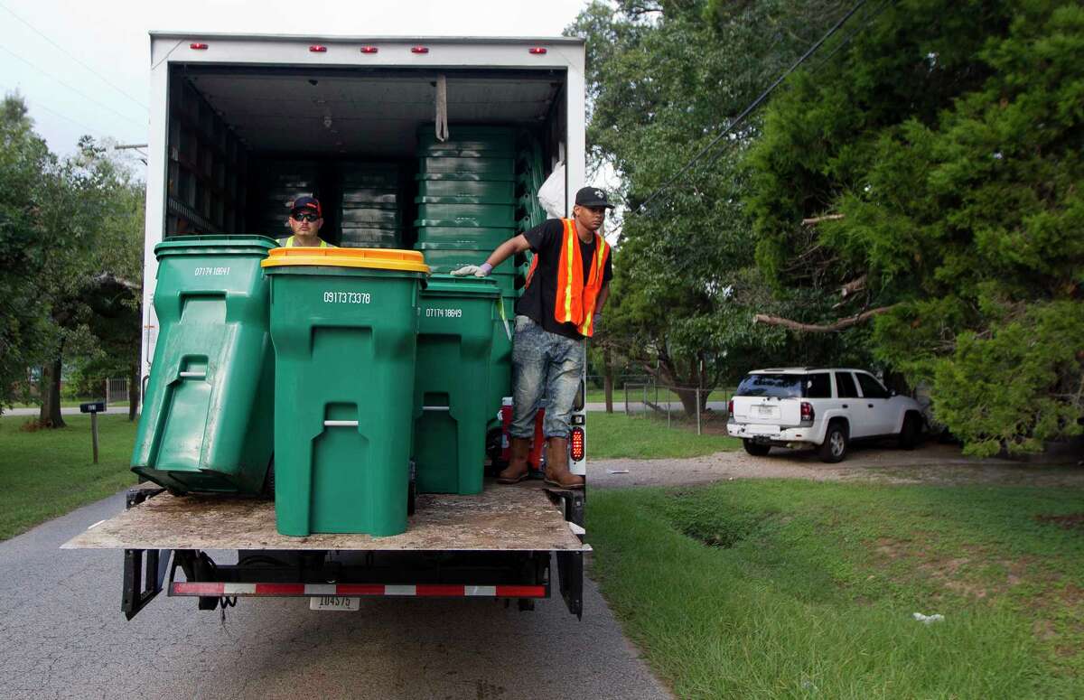 Waste Management delivers new trash cans, service in Conroe