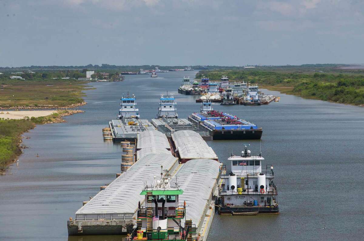 Barges are backed up and not moving currently as they wait in the Gulf Intracoastal Waterway east of the Colorado River Locks in Matagorda, TX, Tuesday, Sept. 19, 2017. Vessels cannot currently travel through the locks until silt buildup is remedied. (Mark Mulligan / Houston Chronicle)