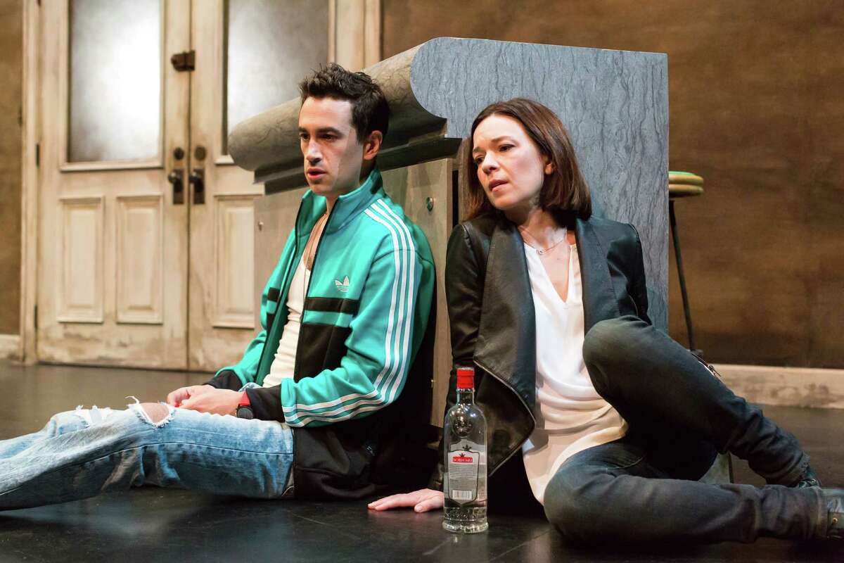 Stephen Stocking portrays Feliks and Elizabeth Bunch is Mariya in Alley Theatre's world premiere of "Describe the Night" by Rajiv Joseph.