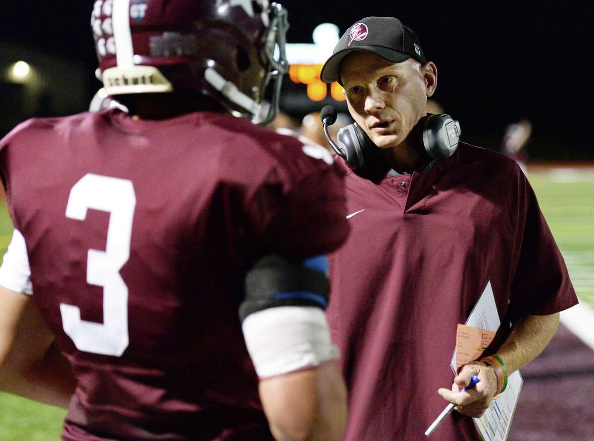 Burnt Hills coach Matt Shell with player #3 Jeremy Clayton on the sidelines during Friday night's game against Averill Park Sept. 22, 2017 in Burnt Hills, NY. (John Carl D'Annibale / Times Union)