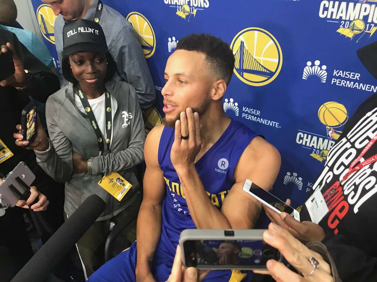 Golden State Warriors Stephen Curry takes questions from the media after NBA basketball practice in Oakland, Calif., on Saturday, Sept. 23, 2017. President Trump rescinded the Warriors White House invitation just a few hours before the Warriors had planned to discuss the possibility of a visit later in the season.
