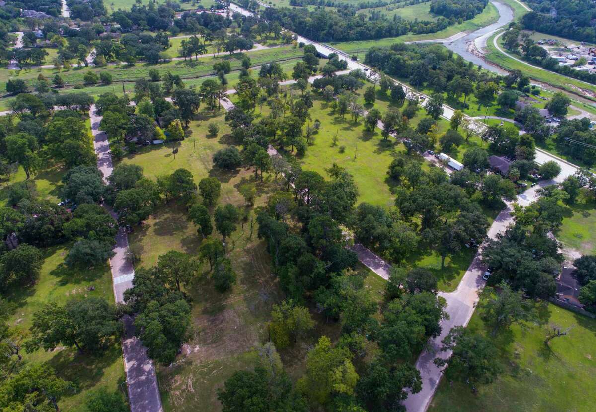 Much of the Arbor Oaks neighborhood in northwest Houston sits empty. All but 13 of the original 160 homes were sold to the flood district after previous flooding. (Mark Mulligan / Houston Chronicle)
