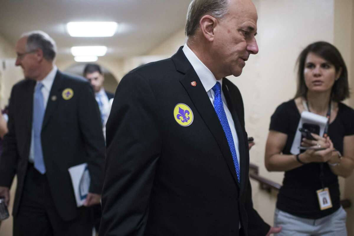 UNITED STATES - JUNE 21: Reps. Louie Gohmert, R-Texas, right, and Mike Conaway, R-Texas, leave a meeting of the House Republican Conference in the Capitol on June 21, 2017. Members wore fleur-de-lis stickers to honor House Majority Whip Steve Scalise, R-La., who was injured in last week's shooting at the Republican baseball practice. (Photo By Tom Williams/CQ Roll Call) (CQ Roll Call via AP Images)