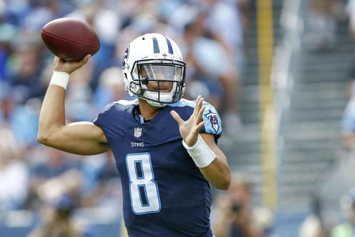 NASHVILLE, TN - SEPTEMBER 24: Quarterback Marcus Mariota #8 of the Tennesee Titans makes a pass against Seattle Seahawks at Nissan Stadium on September 24, 2017 in Nashville, Tennessee. (Photo by Wesley Hitt/Getty Images)