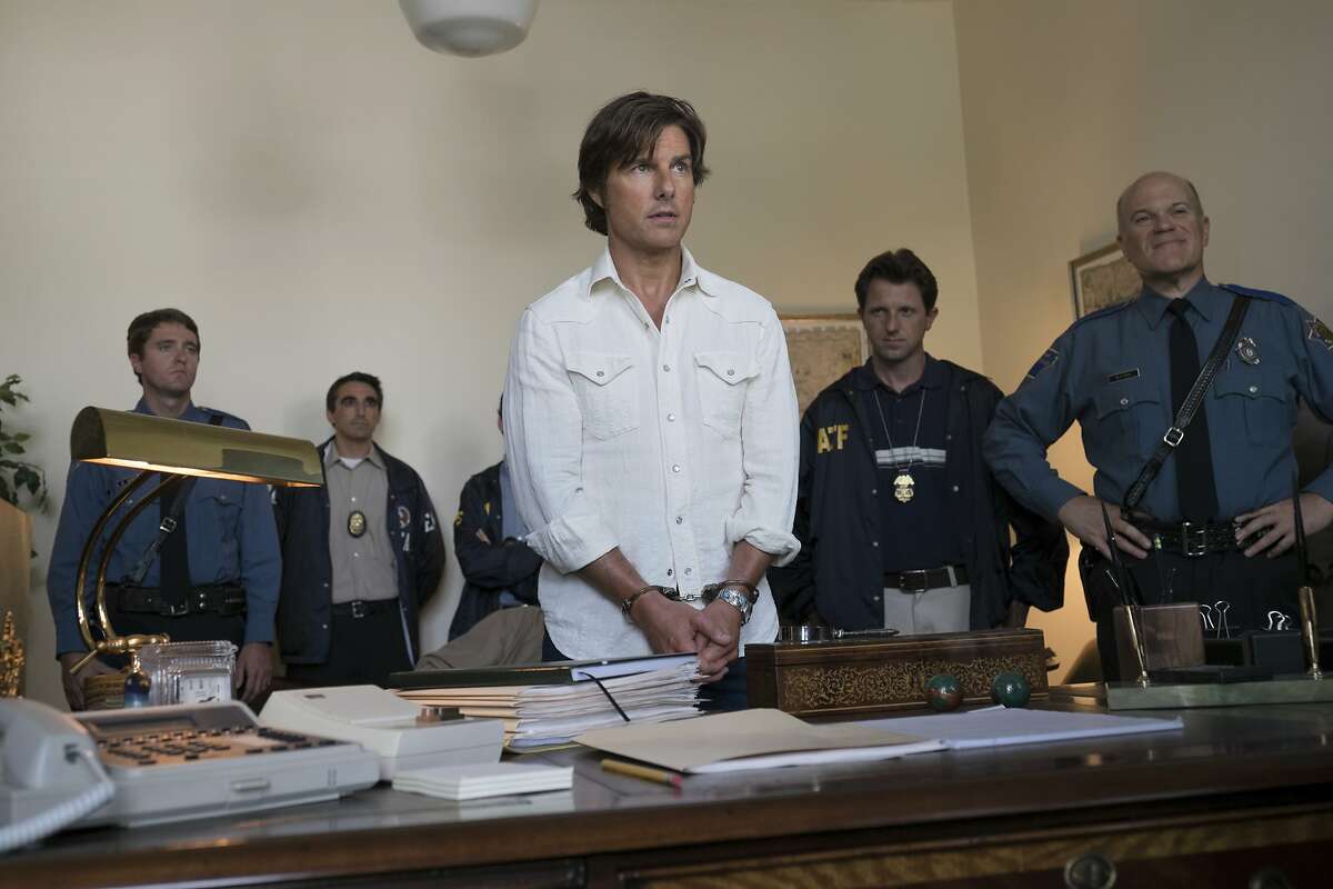 This image released by Universal Pictures shows Tom Cruise as Barry Seal in a scene from, "American Made." (David James/Universal Pictures via AP)