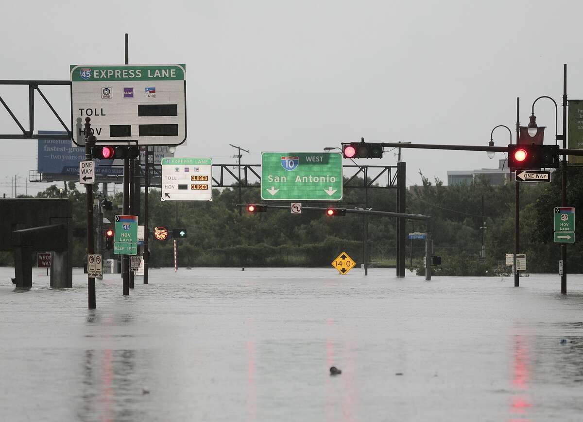 Louisiana Street is flooded where it becomes I-10 in downtown Houston as Hurricane Harvey inches its way through the area on Sunday, Aug. 27, 2017.