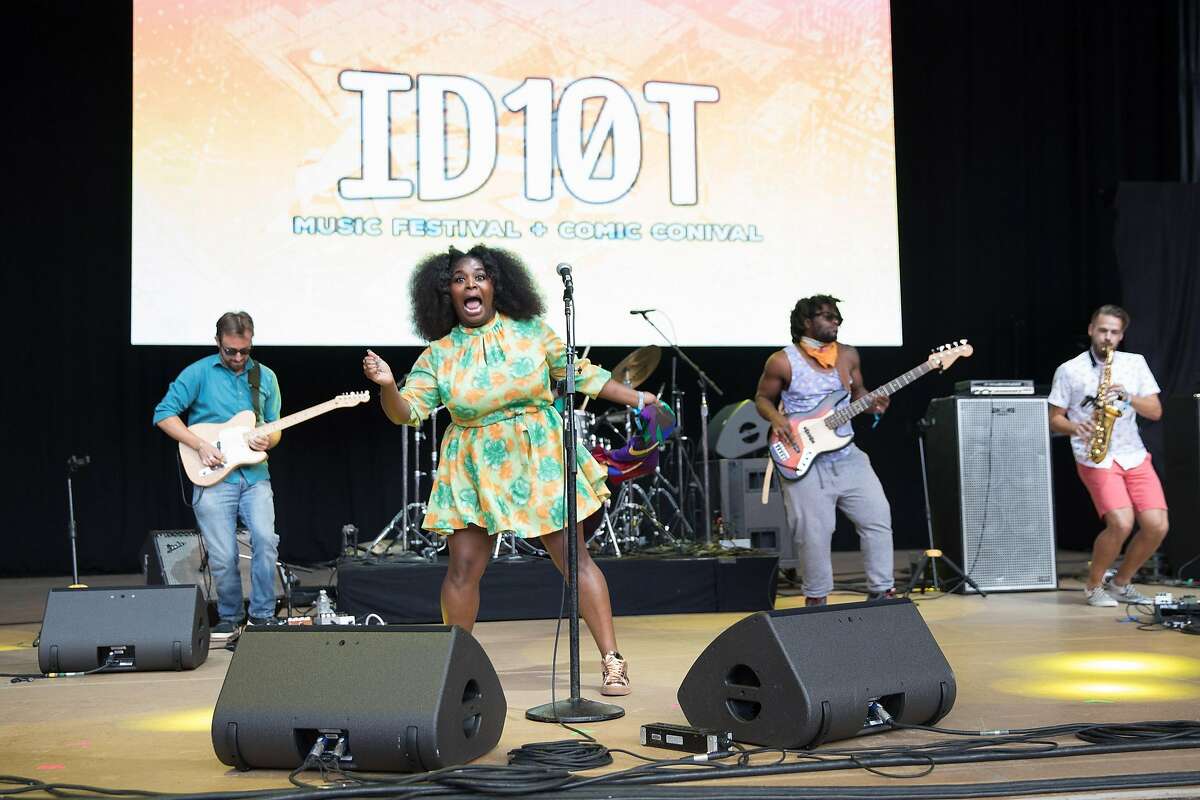 MOUNTAIN VIEW, CA - JUNE 24: Vocalist Tarriona Bal, bassist Jonathan Johnson and saxophonist Etienne Stouflet of Tank and the Bangas perform at ID10T festival at Shoreline Amphitheatre on June 24, 2017 in Mountain View, California.