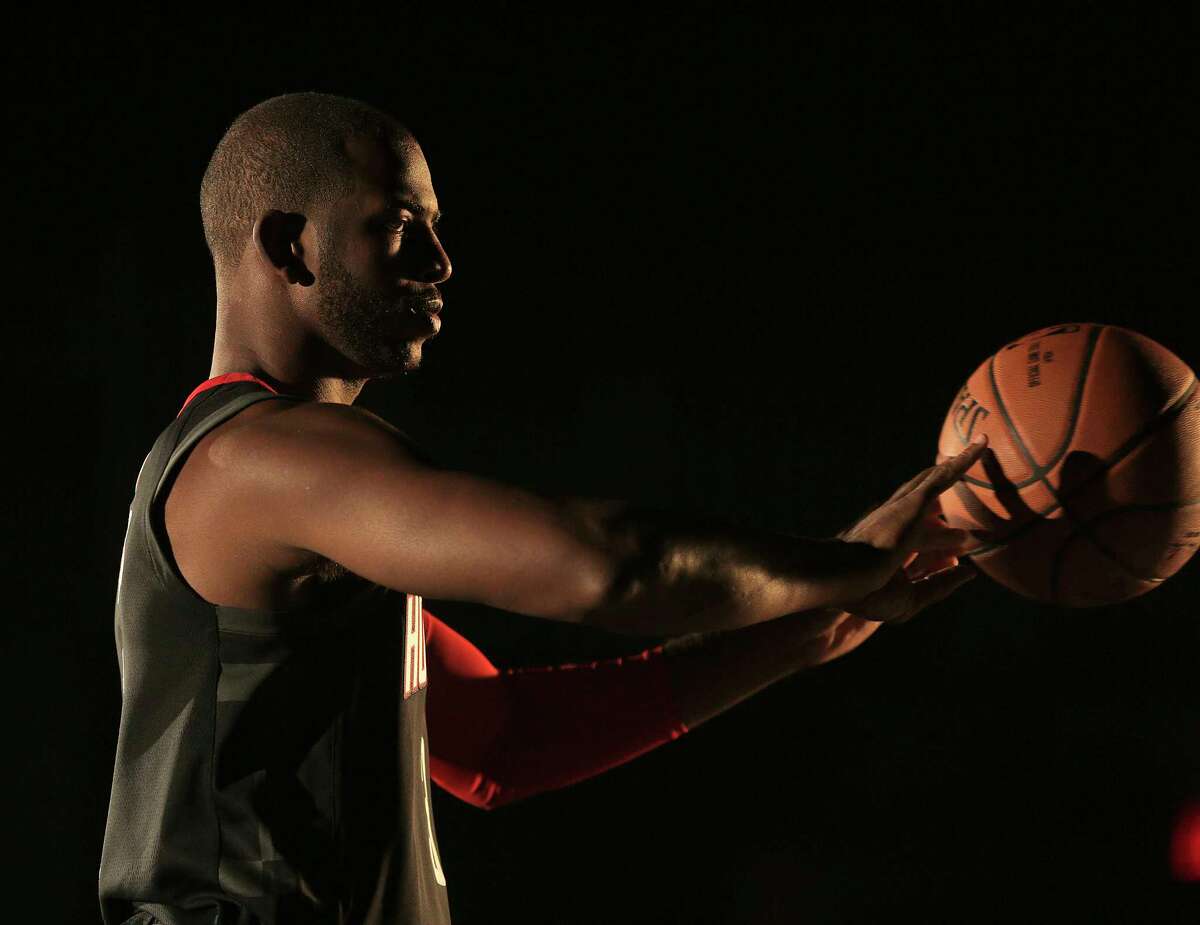 Rocket's Chris Paul (3) films a video during the Houston Rockets media day on Monday, Sept. 25, 2017, in Houston. ( Elizabeth Conley / Houston Chronicle )