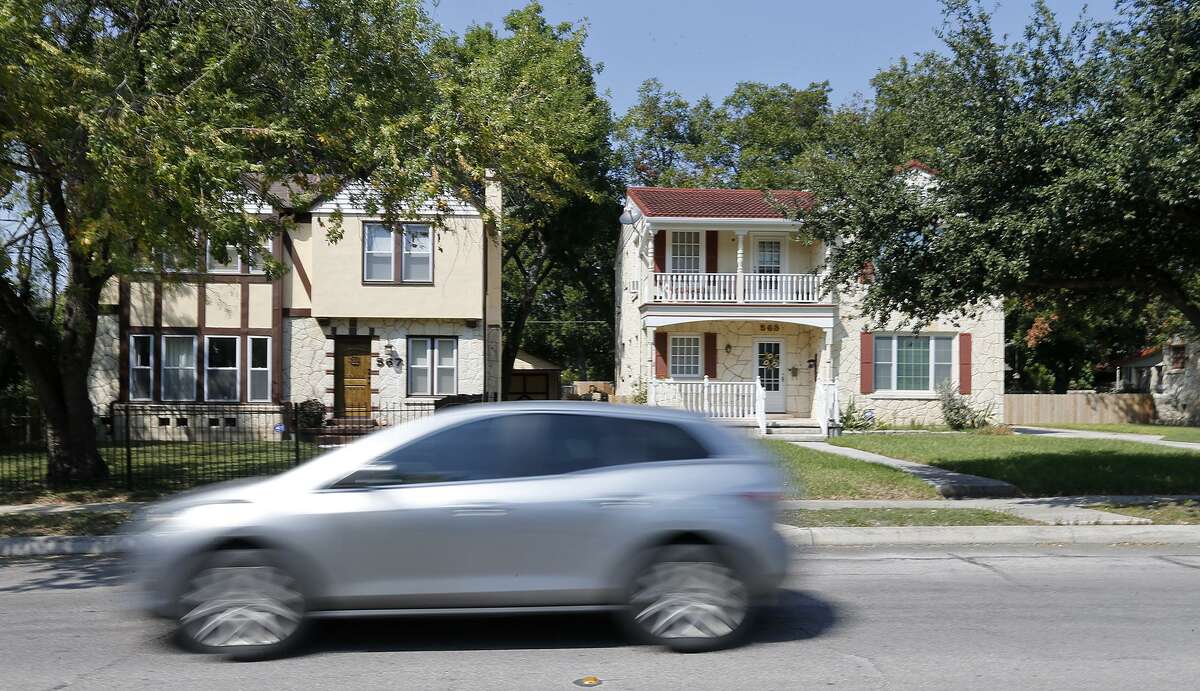 A motorist passes homes in the 500 block of Donaldson Avenue in the Monticello Park Historic District.