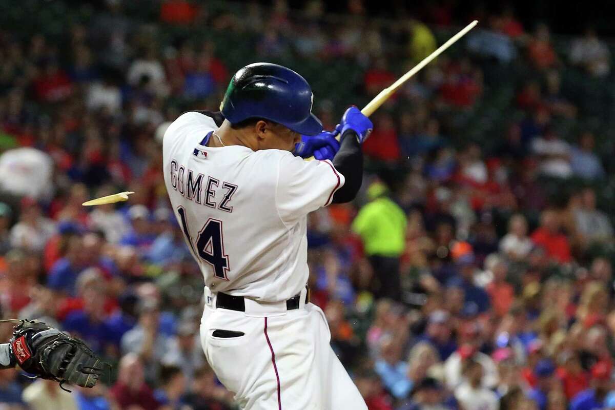ARLINGTON, TX - SEPTEMBER 26: Carlos Gomez #14 of the Texas Rangers splinters his bat on a ground out in the first inning of a baseball game against the Houston Astros at Globe Life Park in Arlington on September 26, 2017 in Arlington, Texas.