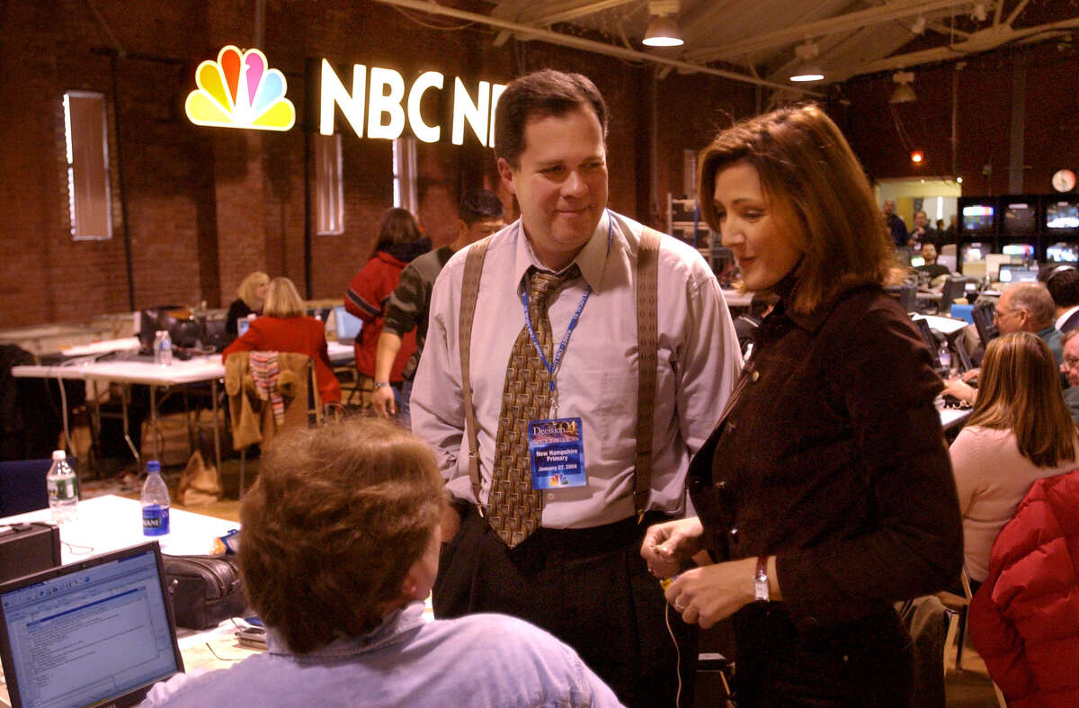 Old friends reunite. Former NewsChannel 13 anchor Chris Jansing, now with MSNBC, chats with NewsChannel 13 anchor Jim Kambrich in the NBC news center in Manchester, NH, on Tuesday January 27, 2004.