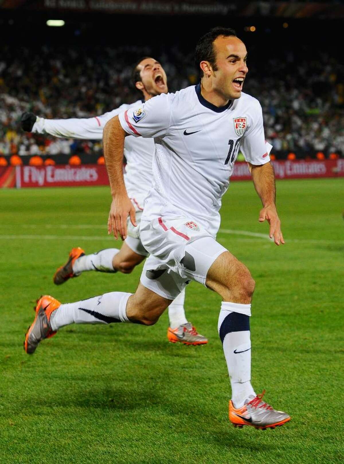 PRETORIA, SOUTH AFRICA - JUNE 23: Landon Donovan and Benny Feilhaber of USA celebrate Donovan's winning goal against Algeria, 1-0, during the 2010 FIFA World Cup South Africa Group C match between USA and Algeria at the Loftus Versfeld Stadium on June 23, 2010 in Tshwane/Pretoria, South Africa. (Photo by Kevork Djansezian/Getty Images) *** Local Caption *** Landon Donovan;Benny Feilhaber