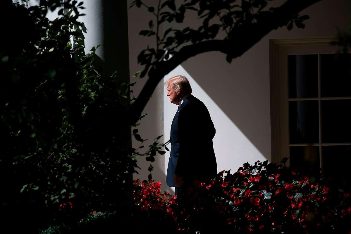 US President Donald Trump walks to Marine One from the Oval Office prior to departing from the South Lawn of the White House in Washington, DC, September 27, 2017, as he travels to Indiana to unveil his tax reform plan. / AFP PHOTO / SAUL LOEBSAUL LOEB/AFP/Getty Images